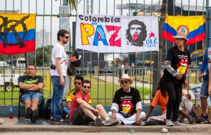 Fans wait outside the venue where the Rolling Stones will play their concert in Havana, Cuba, Friday, March 25, 2016. The Stones are performing in a free concert in Havana Friday, becoming the most famous act to play Cuba since its 1959 revolution.(AP Photo/Desmond Boylan)
