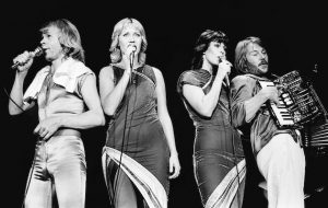 LONDON - NOVEMBER 9: Bjorn Ulvaeus, Agnetha Faltskog, Anni-Frid Lyngstad and Benny Andersson (playing accordion) of Abba perform on stage at Wembley Arena on November 9th 1979 in London. (Photo by Gus Stewart/Redferns)